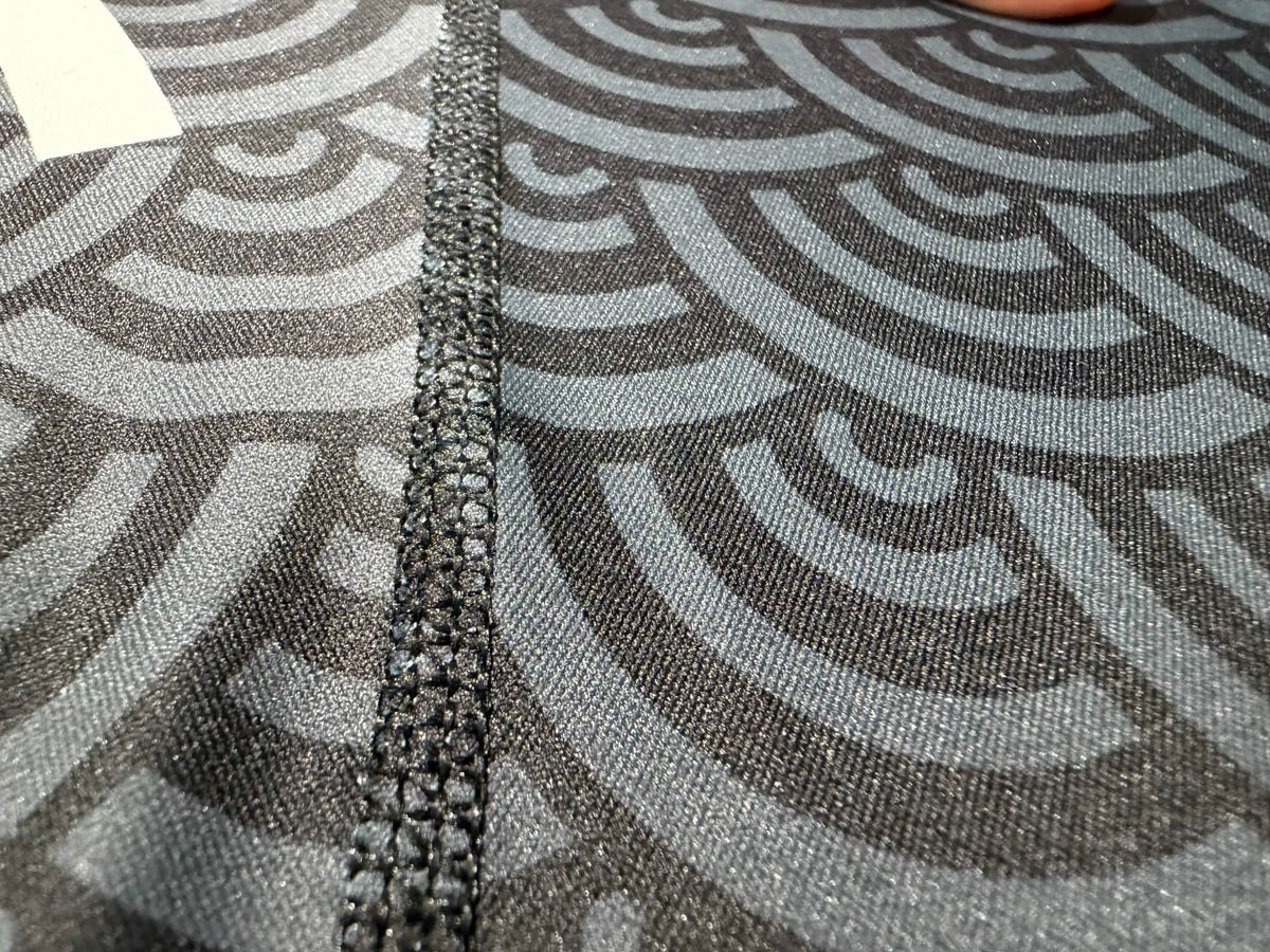 Flatlock seam detail on Mat Theory rashguard