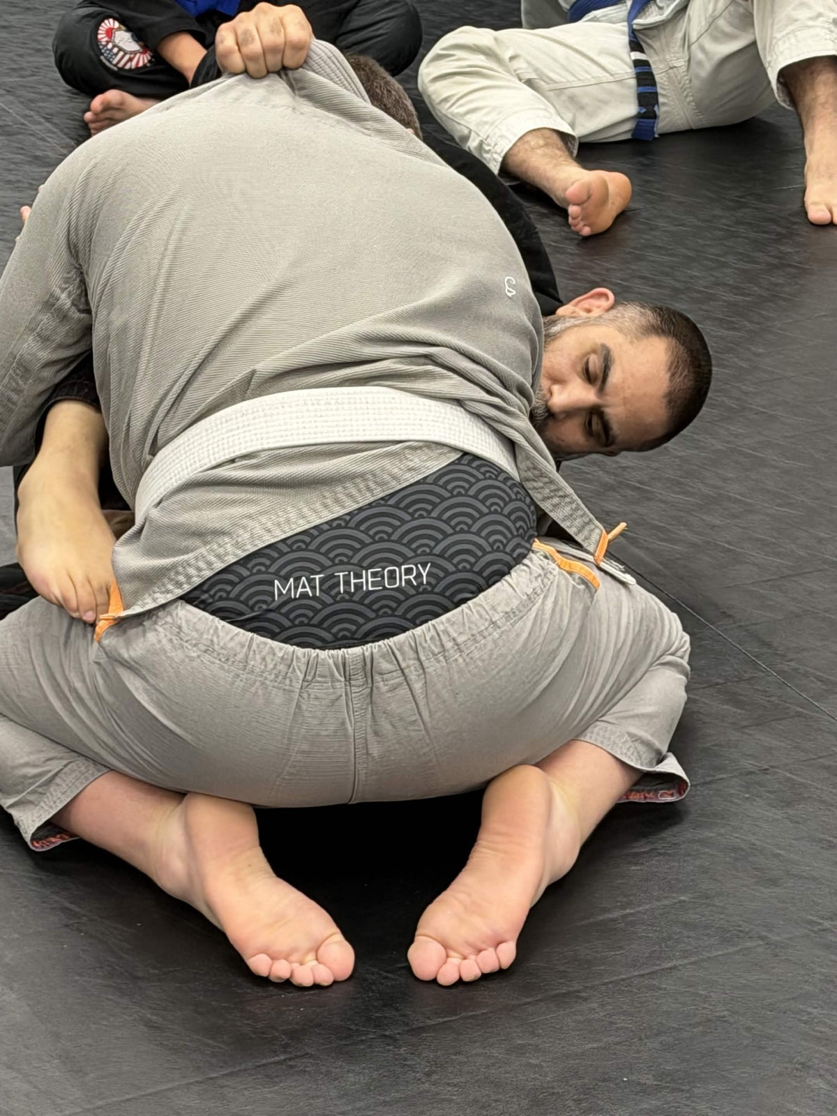 Mat Theory rashguard worn during jiu-jitsu training
