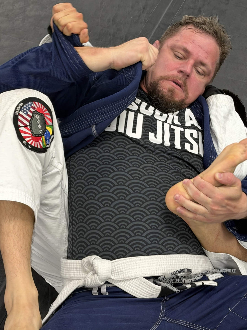 Mat Theory rashguard during live jiu-jitsu training